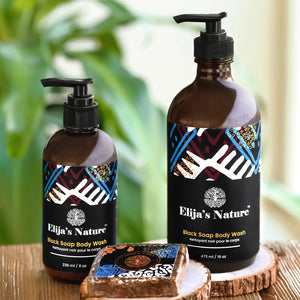 Group of Elija’s Nature body wash bottles with a Black Soap Bar in a bathroom