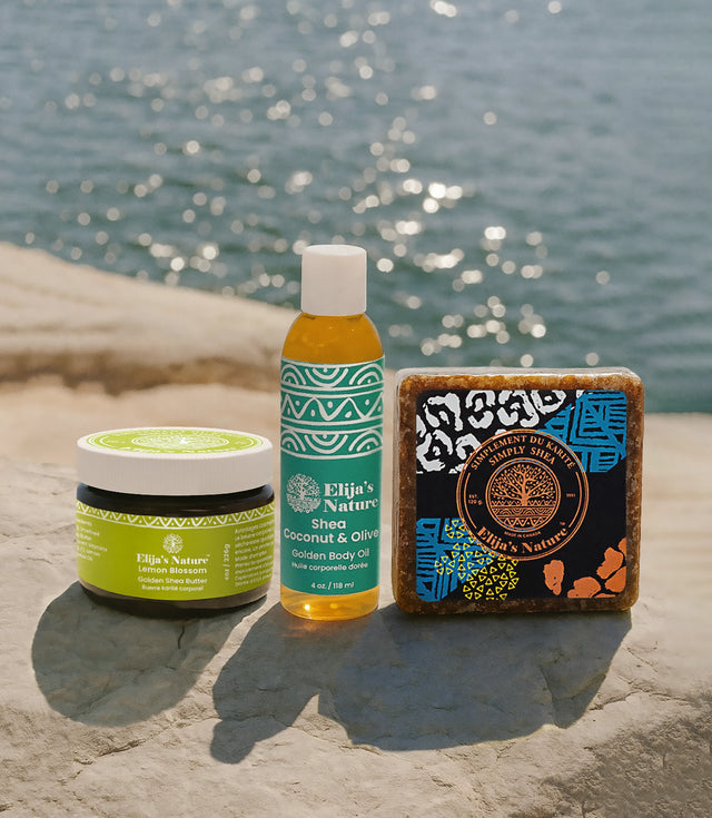 The three products from the Morning Glory Gift Set in Olive Coconut displayed on a sunlit stone surface by the water